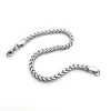 A stainless steel wheat chain bracelet with a polished silver-tone finish and lobster clasp, displayed against a white background.