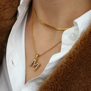 18K gold "M" initial necklace with zircon crystals, smooth flat snake chain, waterproof and fade-resistant.