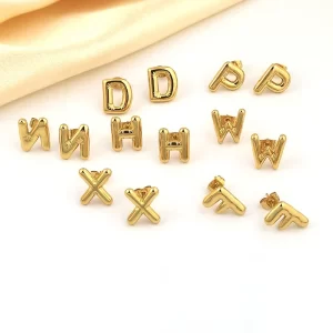 Set of gold letter stud earrings in various designs, waterproof and tarnish-resistant.