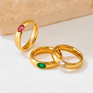 Set of 18K gold rings with pink, green, and clear cubic zirconia gemstones, waterproof and tarnish-resistant.