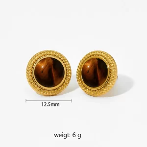 Gold earrings featuring a round tiger eye stone surrounded by gold beading.