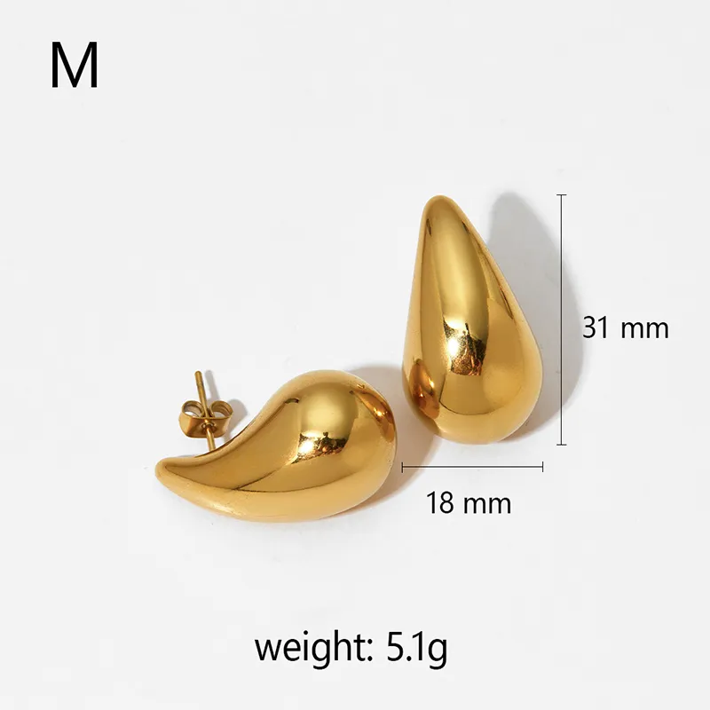 Gold stainless steel teardrop earrings, M size, 31mm in length, and 5.1g lightweight, offering a modern and sleek design.