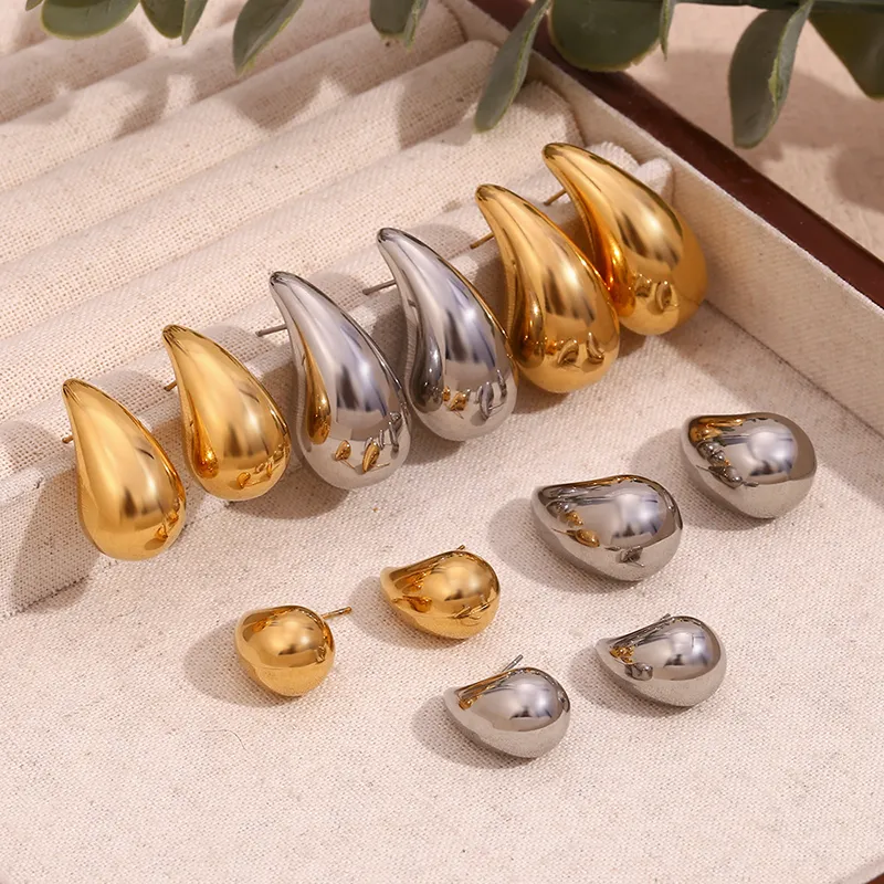 Collection of gold and silver stainless steel teardrop earrings in various sizes, offering sleek and modern designs for different styles.