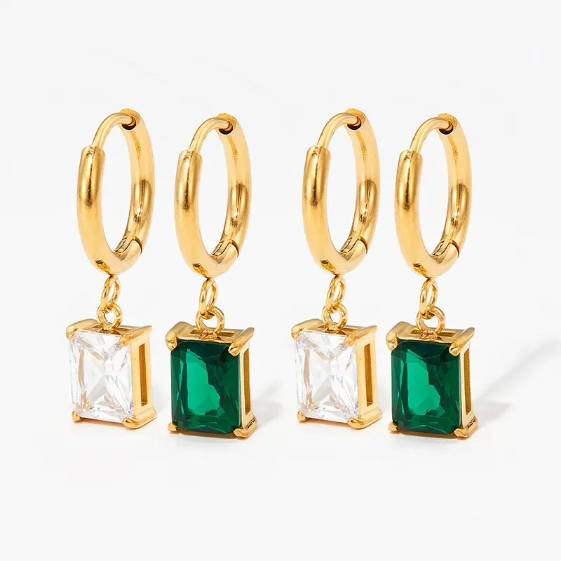 Gold hoop earrings with rectangular cubic zirconia and emerald green stone pendant, sparkling design.