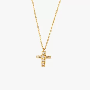 Gold cross necklace with cubic zirconia crystals, hanging from a fine gold chain.