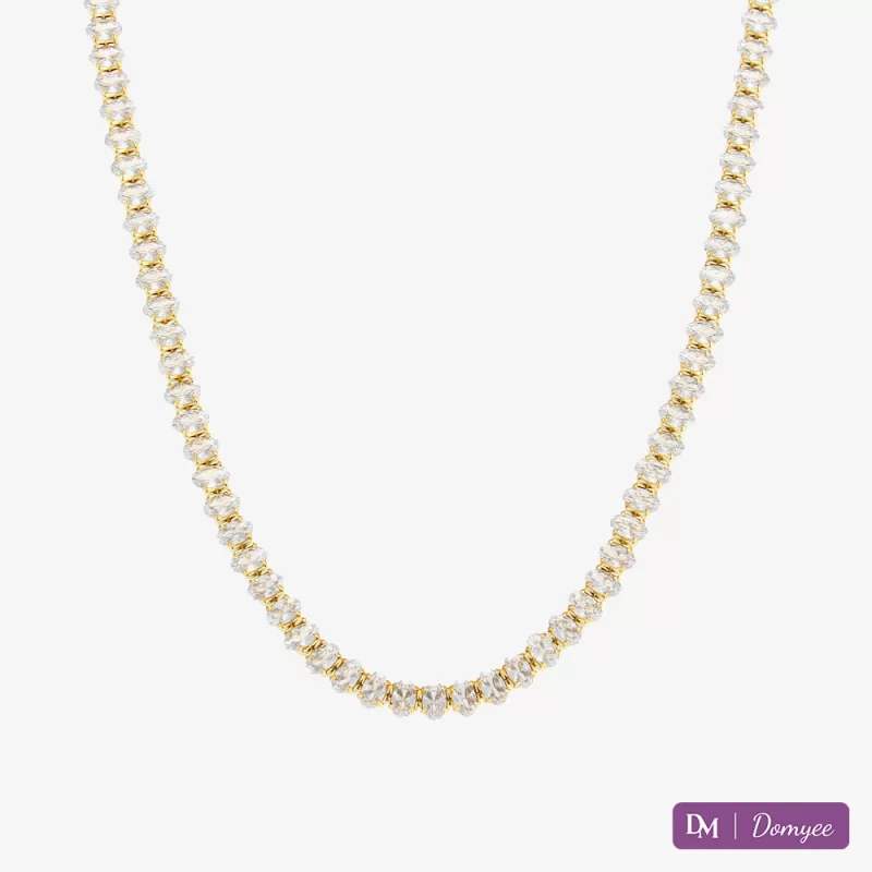 18K gold necklace with oval-cut cubic zirconia stones on a white background