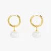 A pair of 18K gold-plated hoop earrings with dangling white pearls, designed to be waterproof and tarnish-resistant.