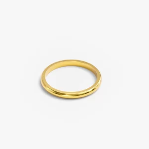 Polished gold ring with a sleek, smooth finish.