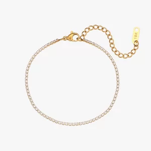 18K gold-plated stainless steel tennis bracelet with cubic zirconia stones and an adjustable chain closure, displayed against a white background.