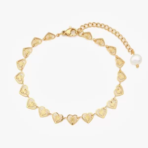18K gold-plated heart chain bracelet with engraved heart details, an adjustable extension chain, and a pearl accent, displayed on a white background.