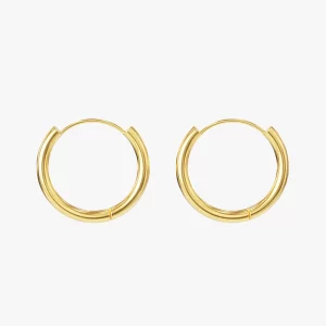 Close-up of gold hoop earrings with a sleek, polished design, perfect for everyday wear.