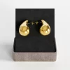 Gold teardrop stud earrings with polished finish, presented in a chic gift box.