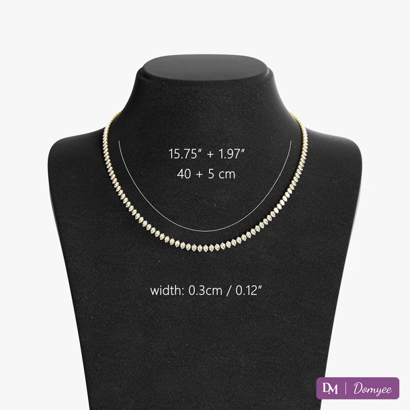 This 18K gold necklace features marquise-cut cubic zirconia stones set on a polished, waterproof chain (0.3cm width). The fade-resistant design ensures enduring brilliance, while the adjustable length (15.75"+1.97" / 40cm+5cm) offers a tailored fit. Captured on a minimalist black stand with clear size labels, it embodies understated luxury for daily wear or formal occasions.